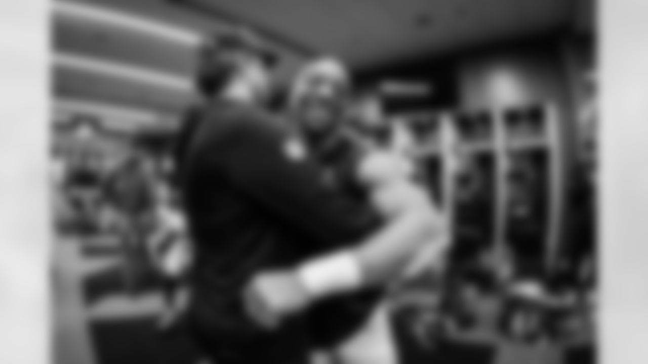 Atlanta Falcons running back Bijan Robinson #7 and Atlanta Falcons offensive coordinator Zac Robinson in the locker room after the Week 17 Game against the Los Angeles Rams at Mercedes-Benz Stadium in Atlanta, Georgia on Monday, December 29, 2025. (Photo by Jay Bendlin/Atlanta Falcons)