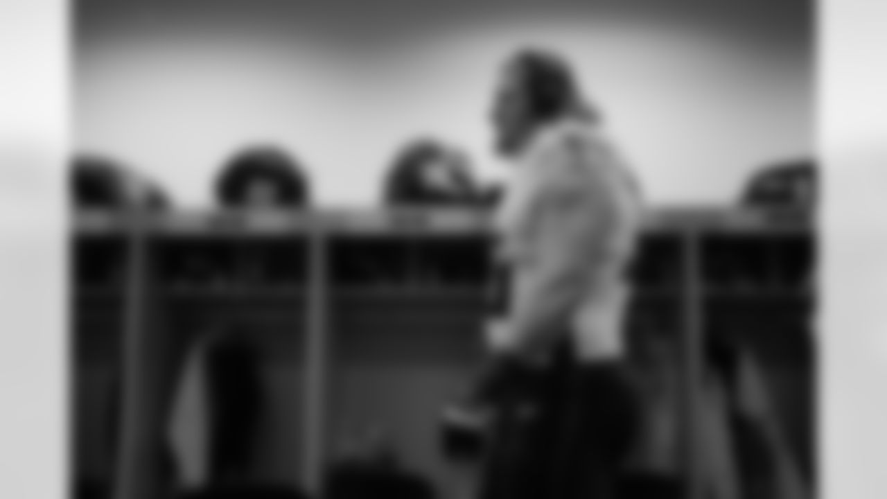 Atlanta Falcons tackle Kaleb McGary #76 in the locker room before the Week 11 Game against the Denver Broncos at Empower Field at Mile High in Denver, Colorado on Sunday, November 17, 2024. (Photo by Brandon Magnus/Atlanta Falcons)