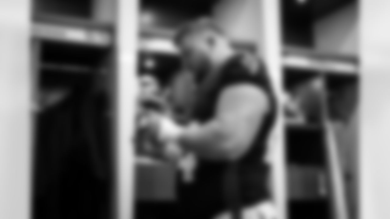 Atlanta Falcons offensive lineman Ryan Neuzil #64 prepares in the locker room before the Week 11 Game against the Carolina Panthers at Mercedes-Benz Stadium in Atlanta, Georgia on Sunday, November 16, 2025. (Photo by Jay Bendlin/Atlanta Falcons)