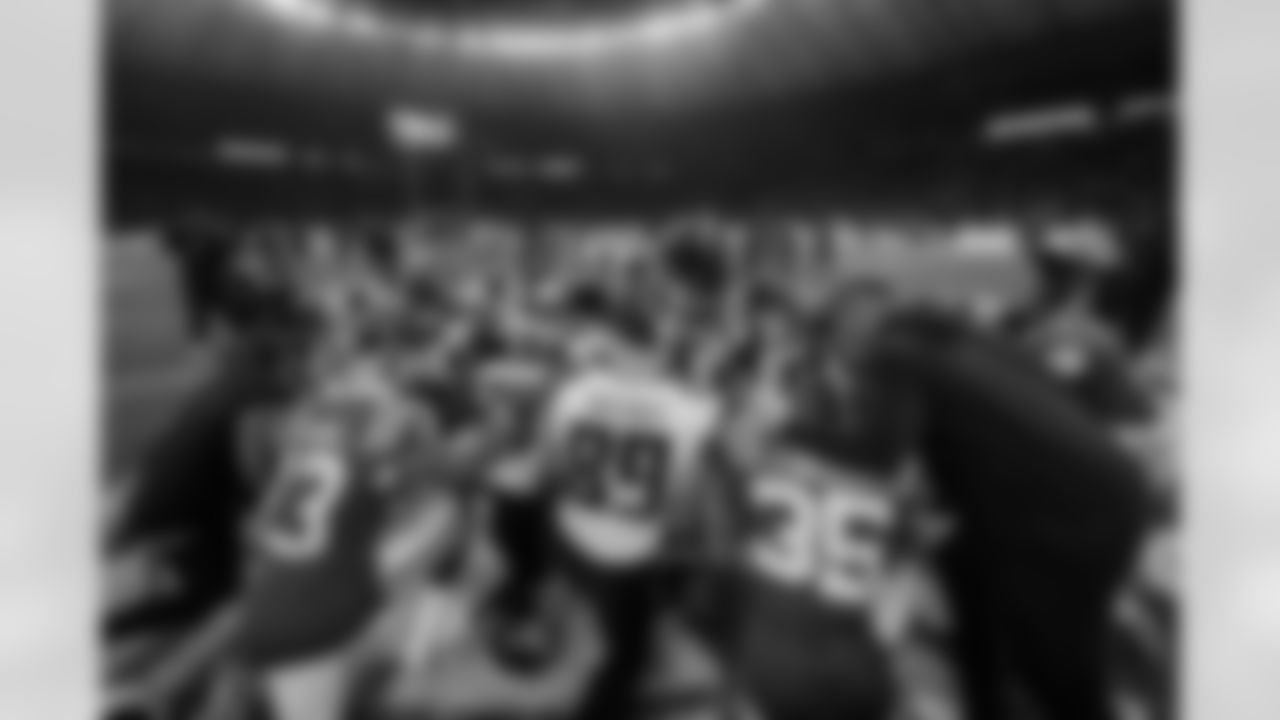 Players pray together after the Week 10 Game against the Indianapolis Colts at Olympic Stadium in Berlin, Germany on Sunday, November 9, 2025. (Photo by Taylor McLaughlin/Atlanta Falcons)