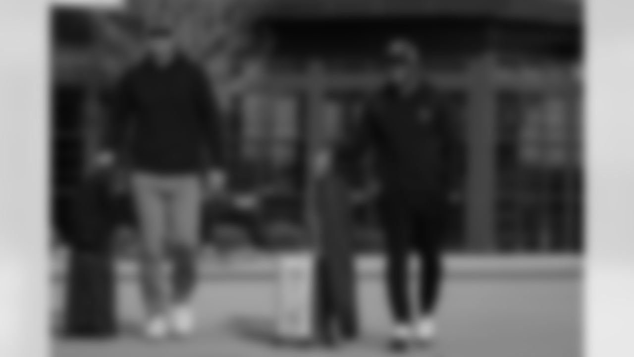 Atlanta Falcons head coach Raheem Morris and Atlanta Falcons wide receivers coach T.J. Yates board the plane at Hartsfield-Jackson International Airport in Atlanta, Ga. on Saturday, November 22, 2025. (Photo by Jay Bendlin/Atlanta Falcons)