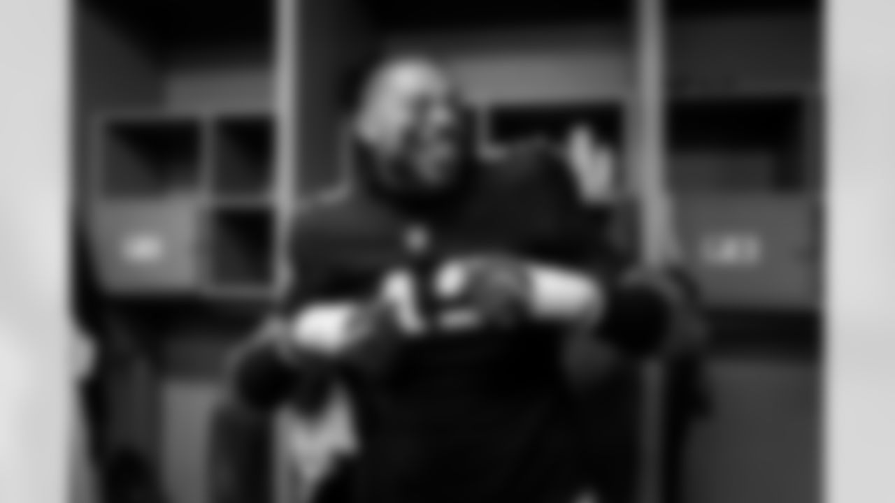 Atlanta Falcons linebacker Josh Woods #42 celebrates in the locker room during the Week 15 Game against the Tampa Bay Buccaneers at Raymond James Stadium in Tampa, Florida on Thursday, December 11, 2025. (Photo by Jay Bendlin/Atlanta Falcons)