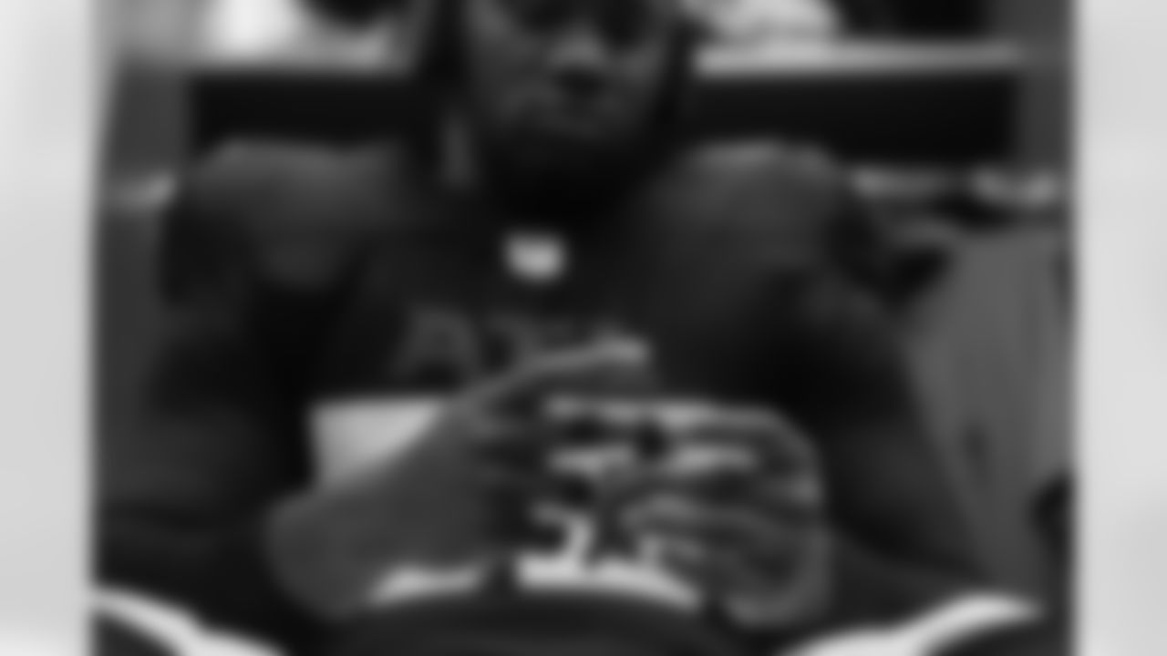 Atlanta Falcons defensive lineman Ruke Orhorhoro #98 in the locker room before the Preseason Game against the Dallas Cowboys at AT&T Stadium in Arlington, Texas on Friday, August 22, 2025. (Photo by Jay Bendlin/Atlanta Falcons)