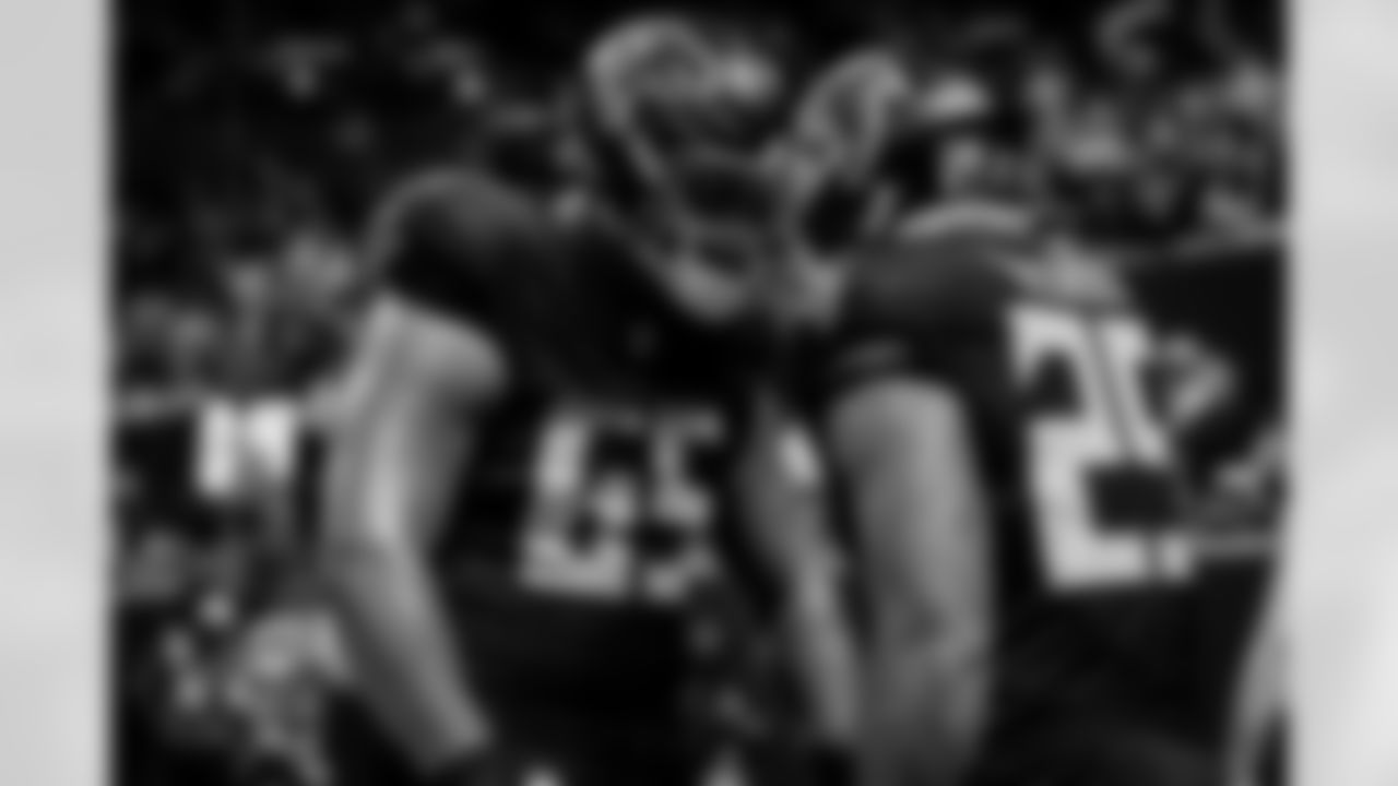 Atlanta Falcons running back Tyler Allgeier #25 and Atlanta Falcons offensive lineman Matthew Bergeron #65 during the Week 4 Game against the Washington Commanders at Mercedes-Benz Stadium in Atlanta, Ga. on Sunday, September 28, 2025. (Photo by Taylor McLaughlin/Atlanta Falcons)