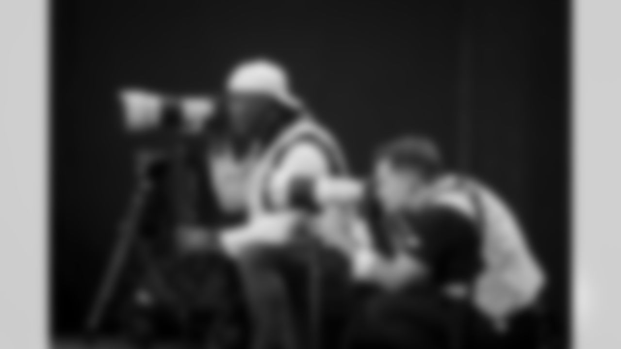 Ken Griffey Jr. and AMBSE Director of Photography and D.A.M. Brandon Magnus photograph on the sidelines during the Week 14 Game against the Seattle Seahawks at Mercedes-Benz Stadium in Atlanta, Georgia on Sunday, December 7, 2025. (Photo by Mitch Martin/Atlanta Falcons)