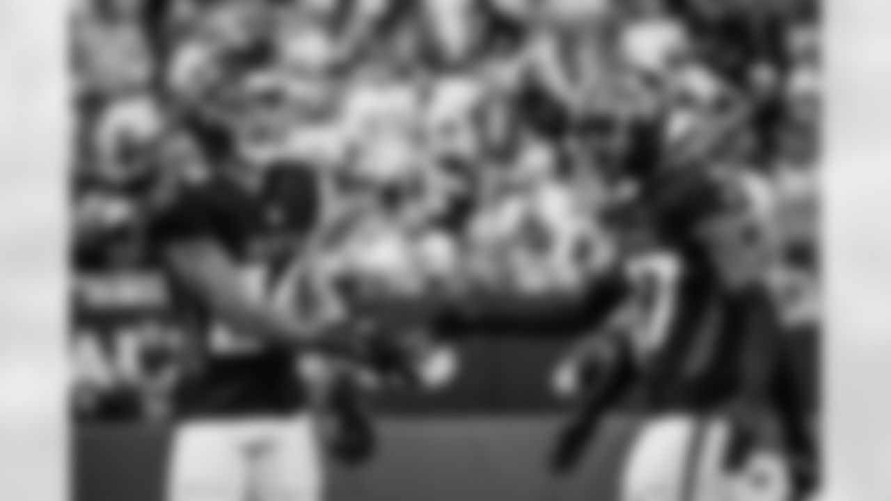 Atlanta Falcons cornerback Cobee Bryant #37 and Atlanta Falcons cornerback A.J. Terrell Jr. #24 high five during the Week 16 Game against the Arizona Cardinals at State Farm Stadium in Glendale, Arizona on Sunday, December 21, 2025. (Photo by Taylor McLaughlin/Atlanta Falcons)