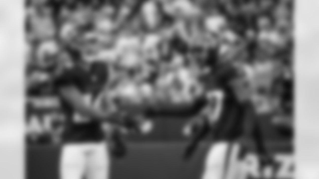 Atlanta Falcons cornerback Cobee Bryant #37 and Atlanta Falcons cornerback A.J. Terrell Jr. #24 high five during the Week 16 Game against the Arizona Cardinals at State Farm Stadium in Glendale, Arizona on Sunday, December 21, 2025. (Photo by Taylor McLaughlin/Atlanta Falcons)