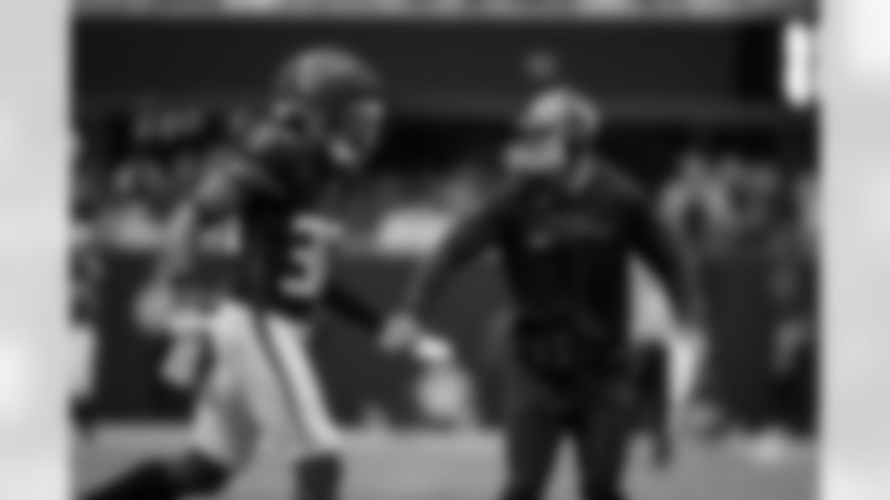 Atlanta Falcons inside linebacker Ronnie Harrison #36 makes a sack and celebrates with Atlanta Falcons defensive coordinator Jeff Ulbrich during the Week 11 Game against the Carolina Panthers at Mercedes-Benz Stadium in Atlanta, Georgia on Sunday, November 16, 2025. (Photo by Taylor McLaughlin/Atlanta Falcons)