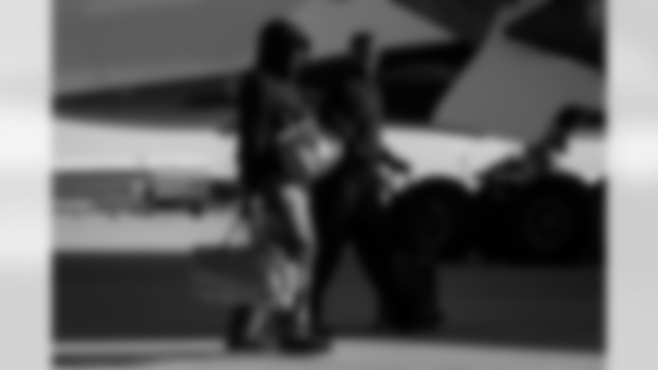 Atlanta Falcons edge rusher Jalon Walker #11 and Atlanta Falcons defensive lineman Ruke Orhorhoro #98 boards the plane at Hartsfield-Jackson International Airport in Atlanta, Ga. on Saturday, December 20, 2025. (Photo by Jay Bendlin/Atlanta Falcons)