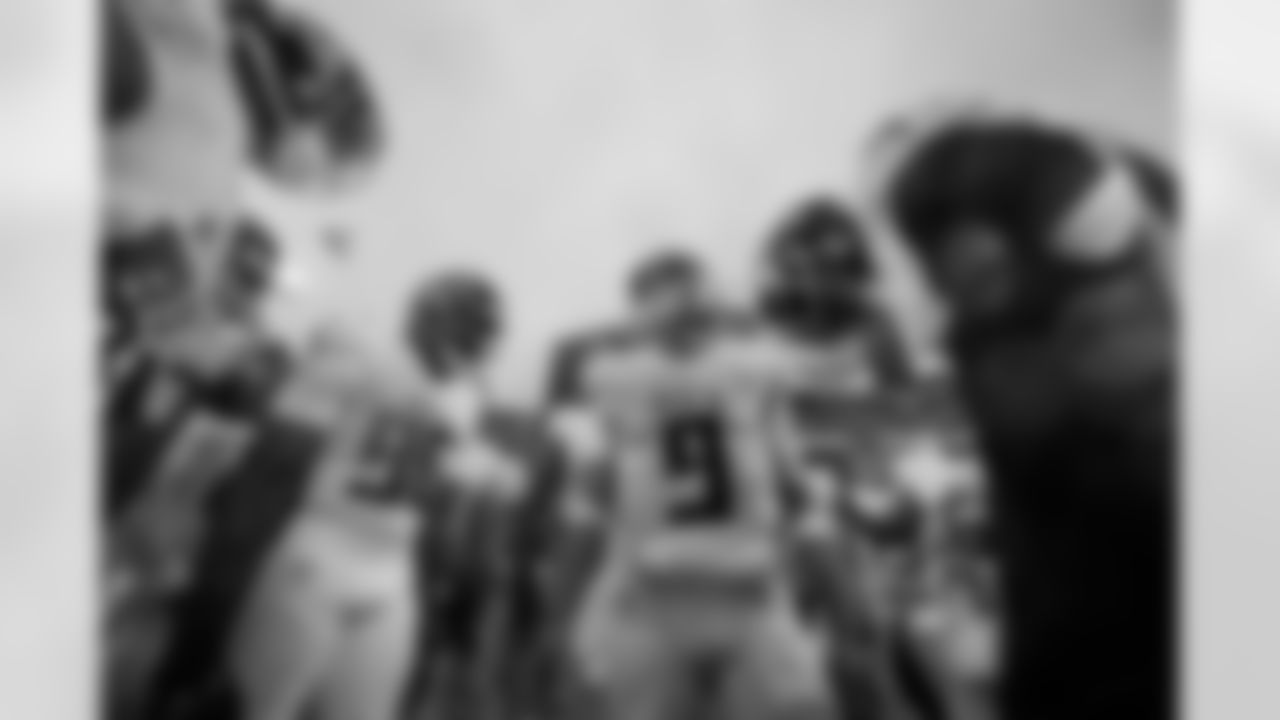 Atlanta Falcons quarterback Desmond Ridder #9 huddle prior to the Week 15 Game against the Carolina Panthers at Bank of America Stadium in Charlotte, North Carolina on Sunday, December 17, 2023. (Photo by Jay Bendlin/Atlanta Falcons)