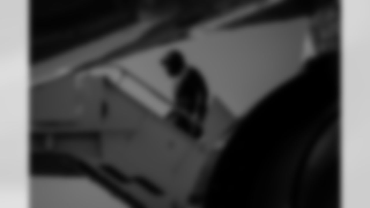 Atlanta Falcons defensive lineman Ta'Quon Graham #95 boards the plane at Hartsfield-Jackson International Airport in Atlanta, Ga. on Saturday, November 1, 2025. (Photo by Jay Bendlin/Atlanta Falcons)