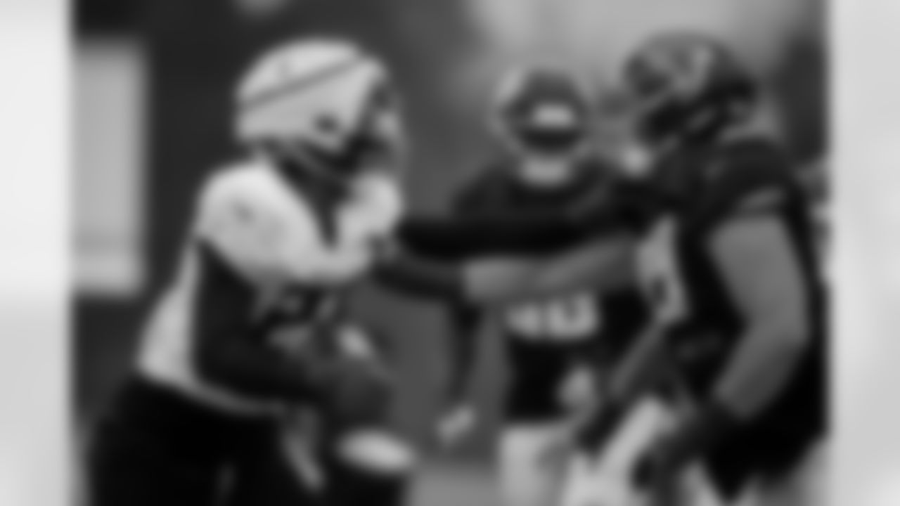 Atlanta Falcons edge rusher James Pearce Jr. #27 and Atlanta Falcons offensive lineman Jack Nelson #69 during practice at Atlanta Falcons Training Facility in Flowery Branch, Georgia, on Thursday, December 4, 2025. (Photo by Taylor McLaughlin/Atlanta Falcons)