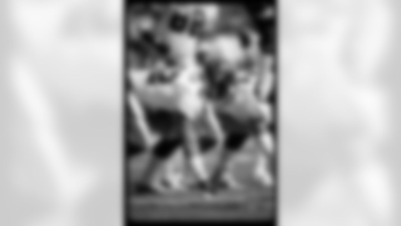 Historical photograph of Falcons game day action from the 1980s.