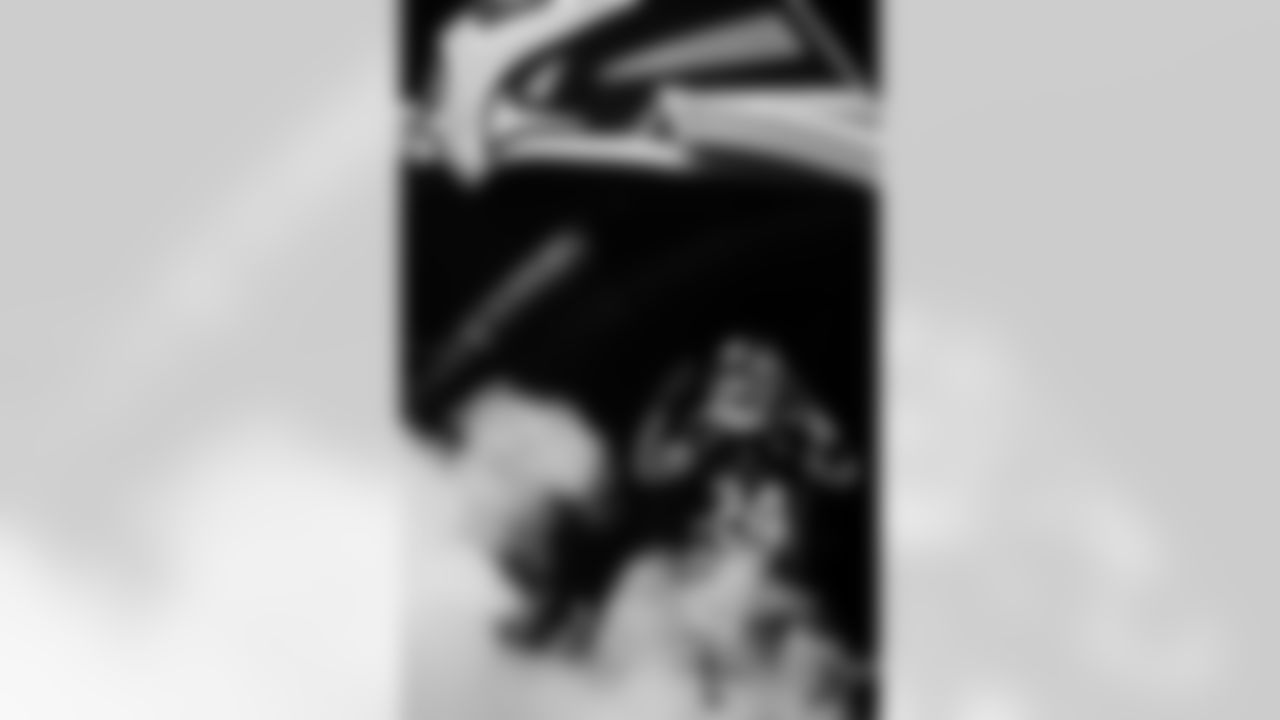 Atlanta Falcons cornerback A.J. Terrell Jr. #24 runs out of the tunnel before the Week 14 Game against the Seattle Seahawks at Mercedes-Benz Stadium in Atlanta, Georgia on Sunday, December 7, 2025. (Photo by Ken Griffey Jr./Atlanta Falcons)