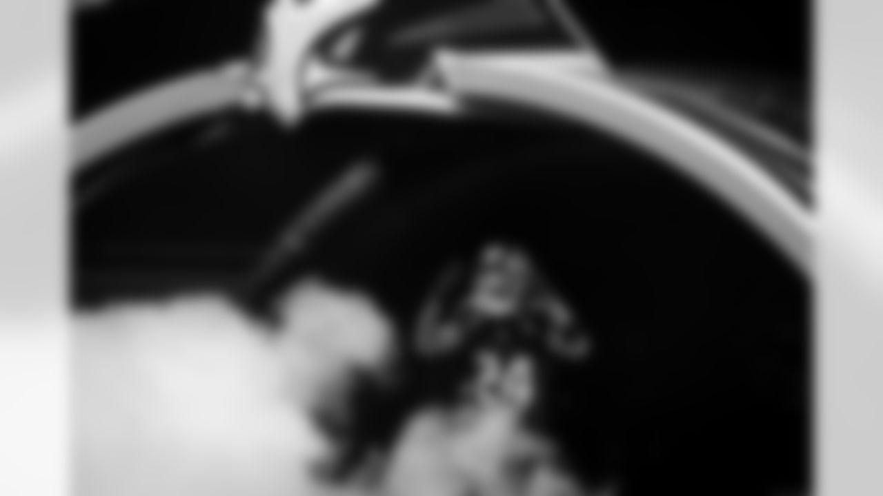 Atlanta Falcons cornerback A.J. Terrell Jr. #24 runs out of the tunnel before the Week 14 Game against the Seattle Seahawks at Mercedes-Benz Stadium in Atlanta, Georgia on Sunday, December 7, 2025. (Photo by Ken Griffey Jr./Atlanta Falcons)