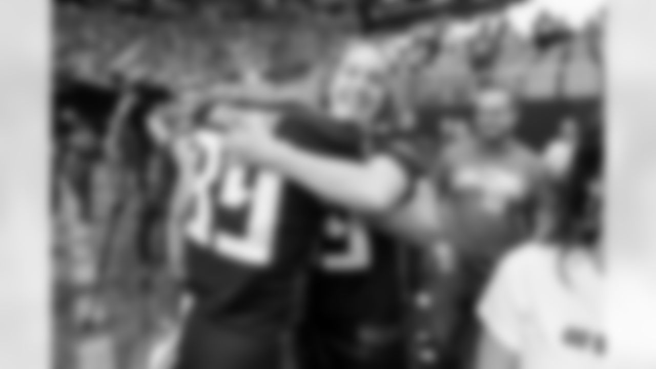 Atlanta Falcons tight end Charlie Woerner #89 hugs family during the Week 7 game against the Seattle Seahawks at Mercedes-Benz Stadium in Atlanta, Ga. on Sunday, October 20, 2024. (Photo by Julian Alexander/Atlanta Falcons)
