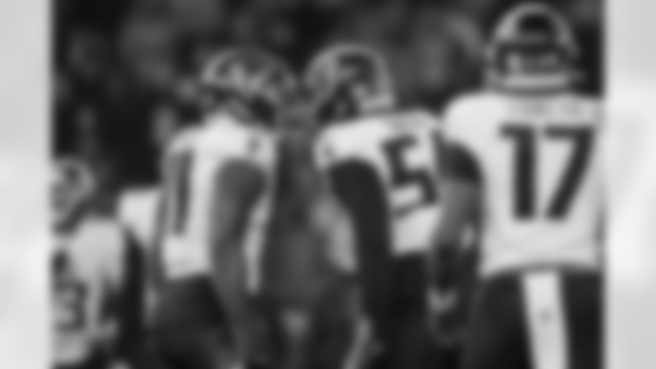 Atlanta Falcons defensive tackle Brandon Dorlus #54 and Atlanta Falcons edge rusher Jalon Walker #11 react during the Week 10 Game against the Indianapolis Colts at Olympic Stadium in Berlin, Germany on Sunday, November 9, 2025. (Photo by Brandon Magnus/Atlanta Falcons)