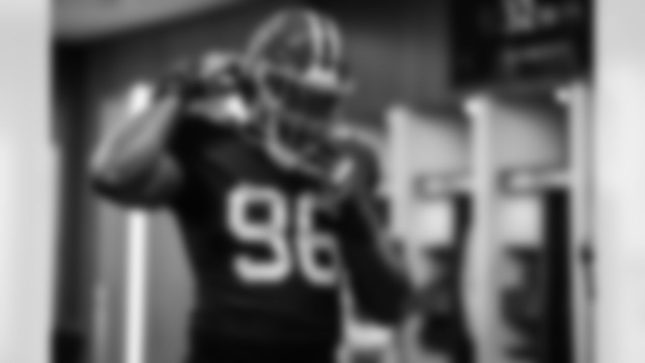 Atlanta Falcons defensive lineman Zach Harrison #96 prepares in the locker room before the Week 6 Game against the Buffalo Bills at Mercedes-Benz Stadium in Atlanta, Georgia on Monday, October 13, 2025. (Photo by Jay Bendlin/Atlanta Falcons)