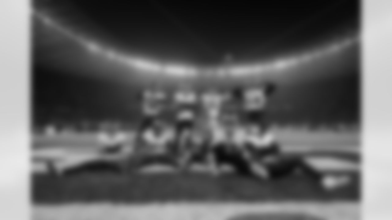 Atlanta Falcons edge rusher Jalon Walker #11 celebrates with teammates after a sack and fumble recovery during the third quarter of the Week 10 Game against the Indianapolis Colts at Olympic Stadium in Berlin, Germany on Sunday, November 9, 2025. (Photo by Taylor McLaughlin/Atlanta Falcons)