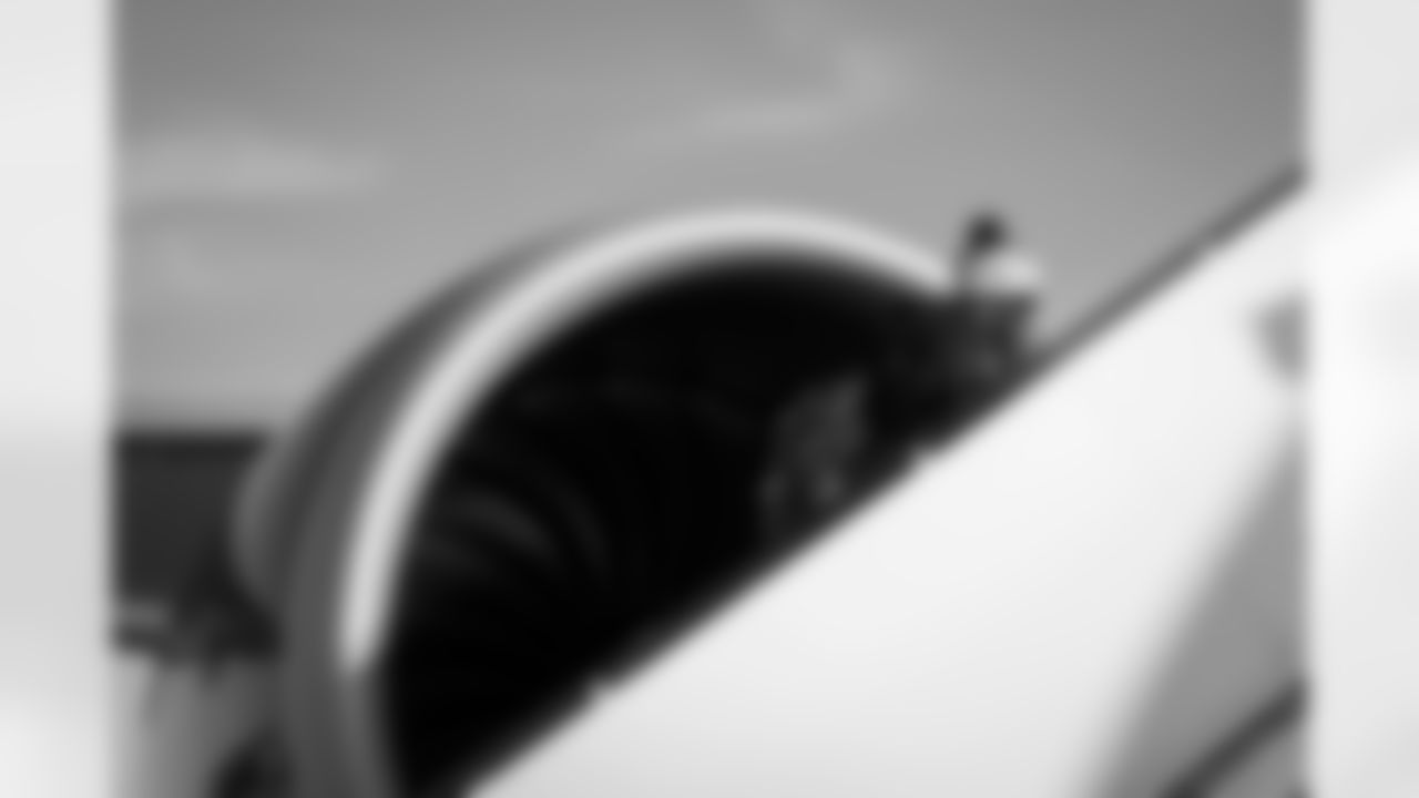 Atlanta Falcons defensive tackle Brandon Dorlus #54 boards the plane at Hartsfield-Jackson International Airport in Atlanta, Ga. on Saturday, November 6, 2025. (Photo by Taylor McLaughlin/Atlanta Falcons)