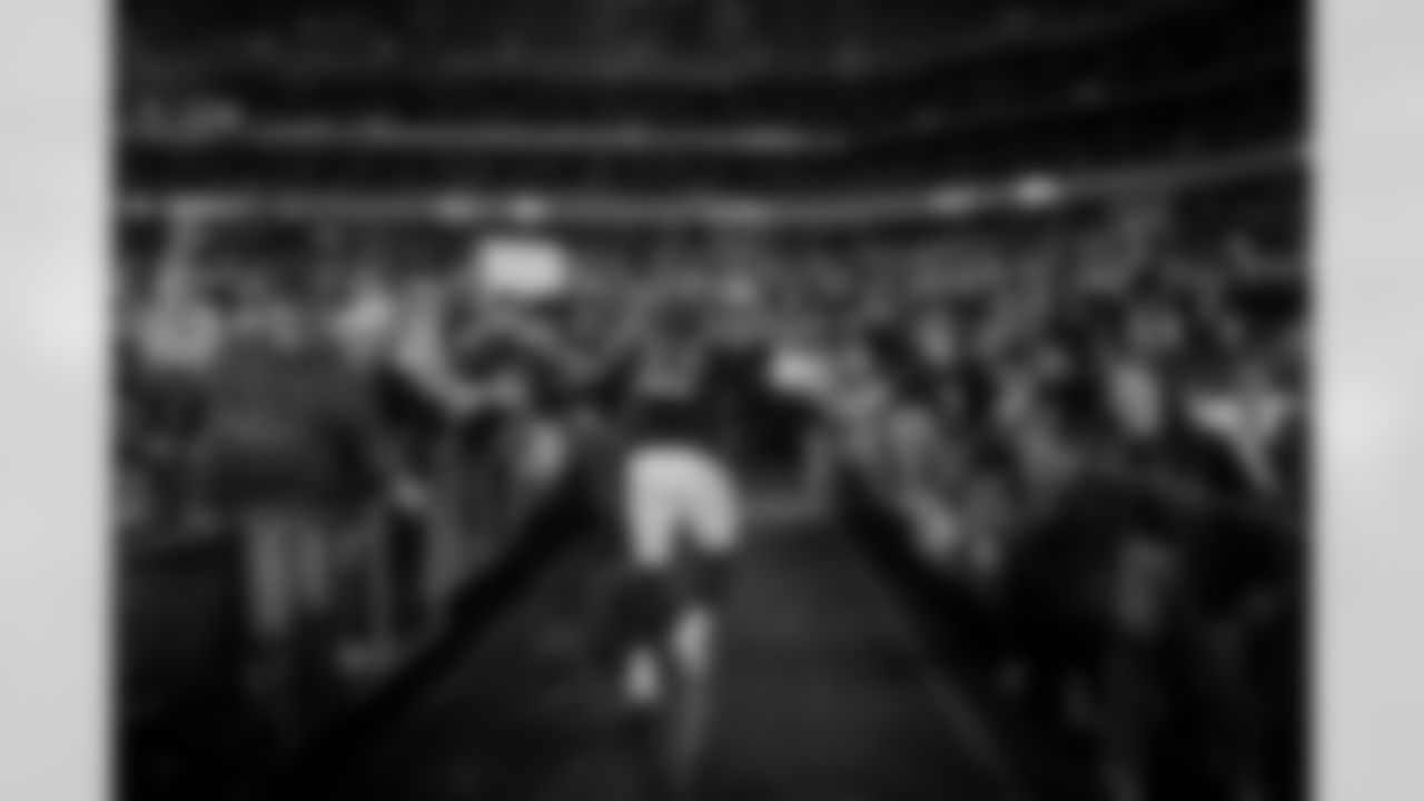 Atlanta Falcons defensive tackle Brandon Dorlus #54 greets fans after the Week 16 Game against the Arizona Cardinals at State Farm Stadium in Glendale, Arizona on Sunday, December 21, 2025. (Photo by Taylor McLaughlin/Atlanta Falcons)