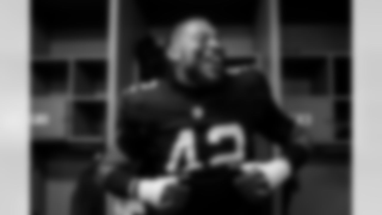 Atlanta Falcons linebacker Josh Woods #42 celebrates in the locker room during the Week 15 Game against the Tampa Bay Buccaneers at Raymond James Stadium in Tampa, Florida on Thursday, December 11, 2025. (Photo by Jay Bendlin/Atlanta Falcons)