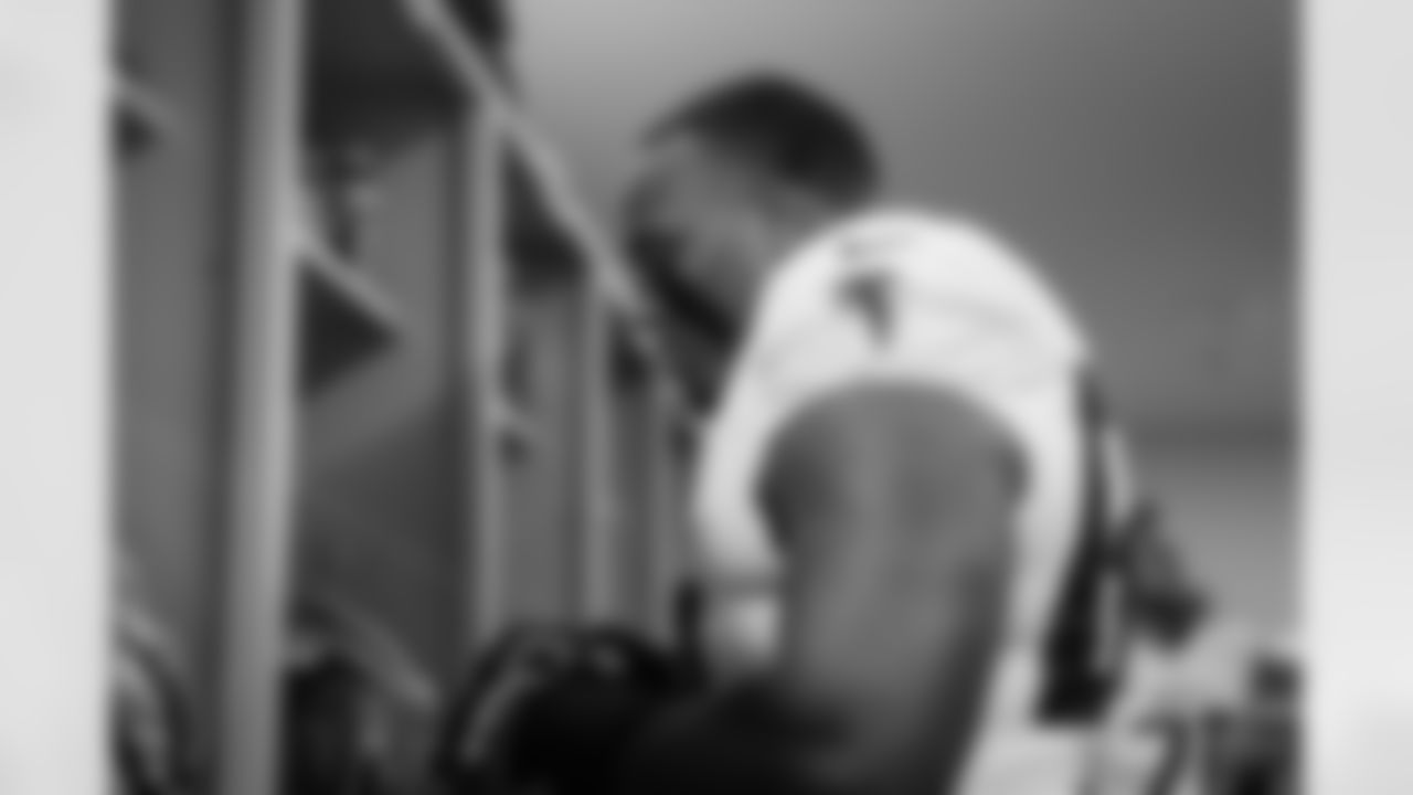 Atlanta Falcons offensive lineman Kyle Hinton #68 prepares in the locker room before the Week 10 Game against the Indianapolis Colts at Olympic Stadium in Berlin, Germany on Sunday, November 9, 2025. (Photo by Jay Bendlin/Atlanta Falcons)