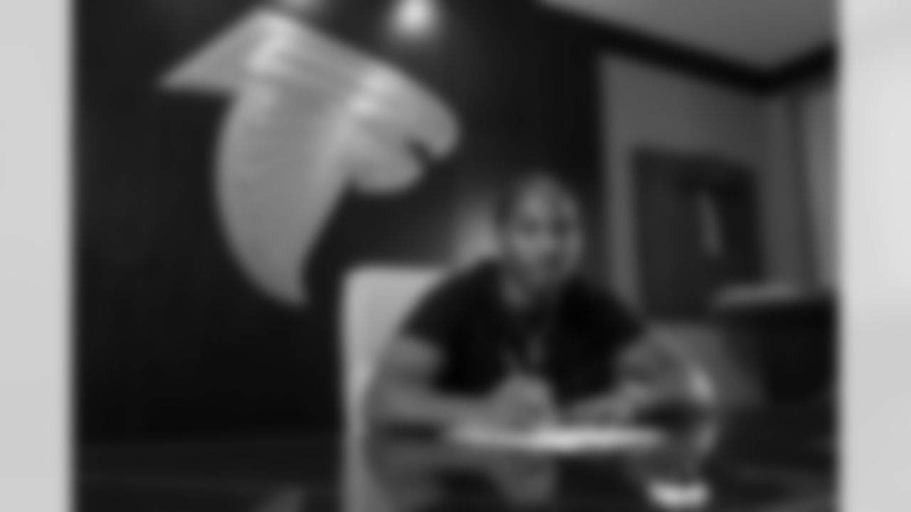 Atlanta Falcons cornerback signs his contract at the Atlanta Falcons Training Facility in Flowery Branch, Ga. on Monday, April 7, 2025. (Photo by Jay Bendlin/Atlanta Falcons)