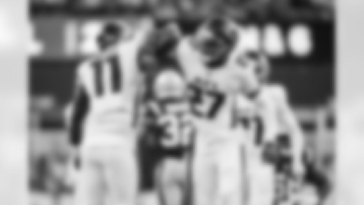 Atlanta Falcons edge rusher Jalon Walker #11 and Atlanta Falcons edge rusher James Pearce Jr. #27 celebrate during the Week 9 Game against the New England Patriots at Gillette Stadium in Foxborough, Massachusetts on Sunday, November 2, 2025. (Photo by Jay Bendlin/Atlanta Falcons)