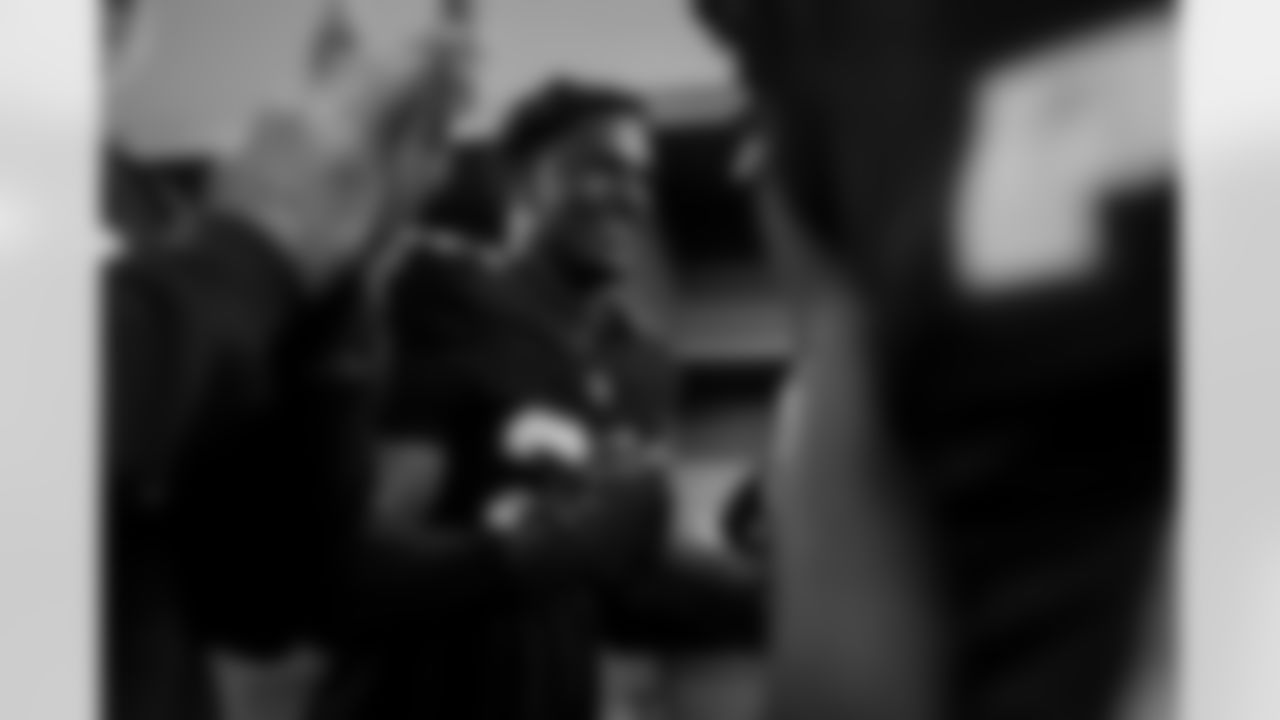 Atlanta Falcons edge rusher James Pearce Jr. #27 celebrates in the locker room during the Week 15 Game against the Tampa Bay Buccaneers at Raymond James Stadium in Tampa, Florida on Thursday, December 11, 2025. (Photo by Jay Bendlin/Atlanta Falcons)
