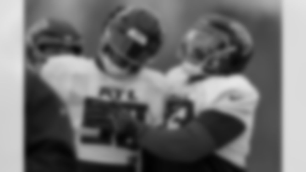 Atlanta Falcons defensive lineman Ruke Orhorhoro #98 and Atlanta Falcons defensive lineman Kentavius Street #93 during practice at Atlanta Falcons Training Facility in Flowery Branch, Georgia, on Thursday, December 4, 2025. (Photo by Taylor McLaughlin/Atlanta Falcons)