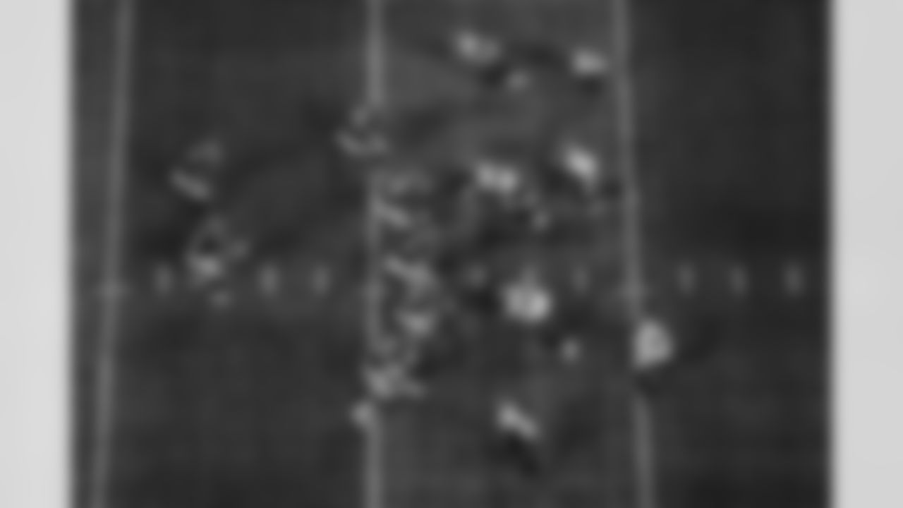 Atlanta Falcons quarterback Kirk Cousins #18 takes a snap from offensive lineman Ryan Neuzil #64 during the Week 5 game against the Tampa Bay Buccaneers at Mercedes-Benz Stadium in Atlanta, Ga. on Thursday, October 3, 2024. (Photo by Shanna Lockwood/Atlanta Falcons)