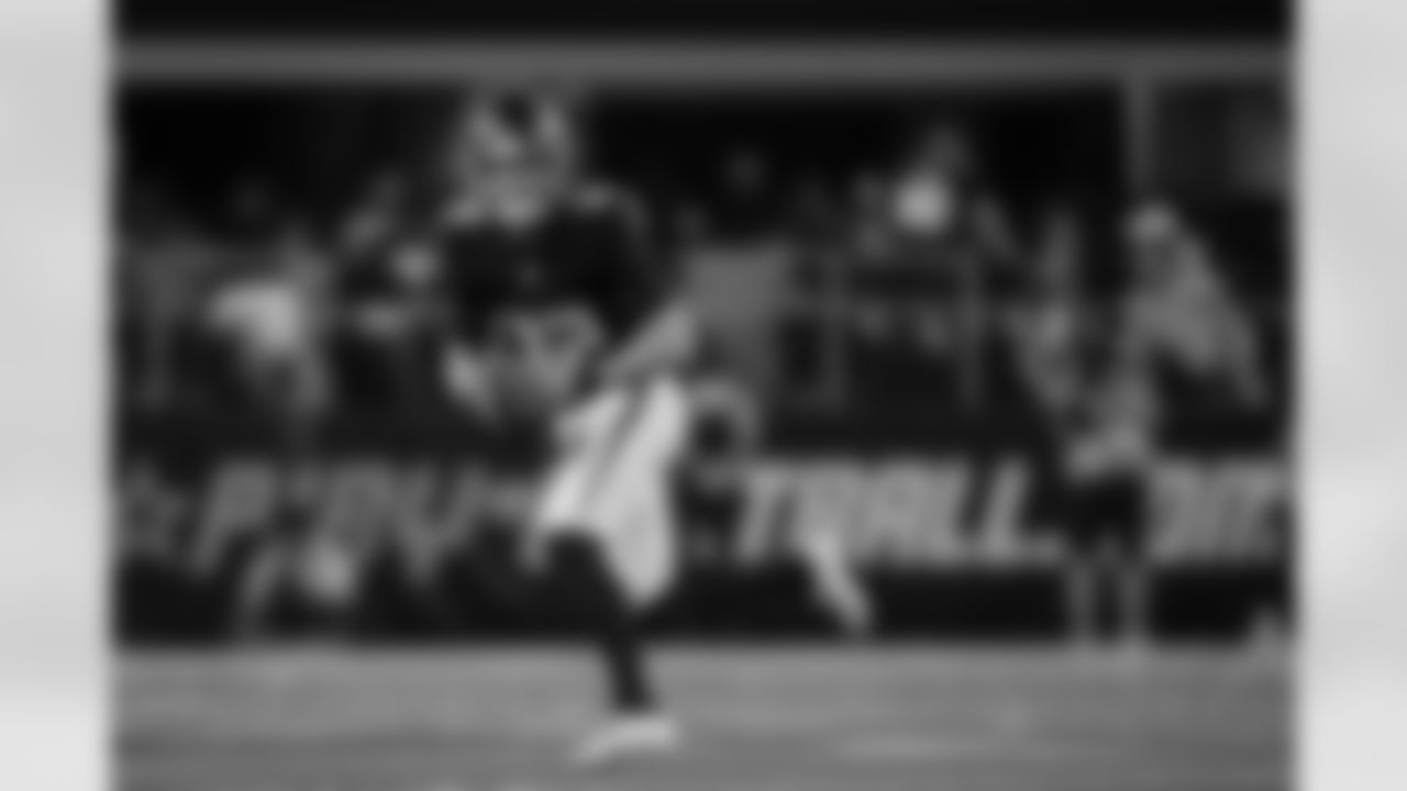 Atlanta Falcons quarterback Easton Stick #12 carries the ball during the Preseason Game against the Dallas Cowboys at AT&T Stadium in Arlington, Texas on Friday, August 22, 2025. (Photo by Jay Bendlin/Atlanta Falcons)