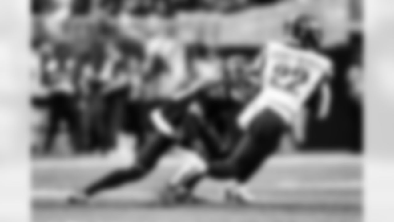 Atlanta Falcons cornerback Mike Hughes #21 makes a tackle during the Week 4 Game against the Washington Commanders at Mercedes-Benz Stadium in Atlanta, Georgia on Sunday, September 28, 2025. (Photo by AJ Reynolds/Atlanta Falcons)