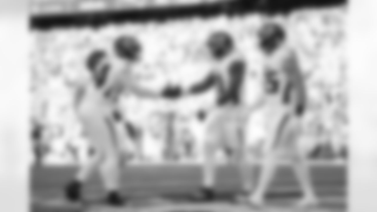 Atlanta Falcons edge rusher Jalon Walker #11 celebrates with Atlanta Falcons defensive tackle Brandon Dorlus #54 after making a sack and forcing a fumble during the Week 9 Game against the New England Patriots at Gillette Stadium in Foxborough, Massachusetts on Sunday, November 2, 2025. (Photo by Jay Bendlin/Atlanta Falcons)
