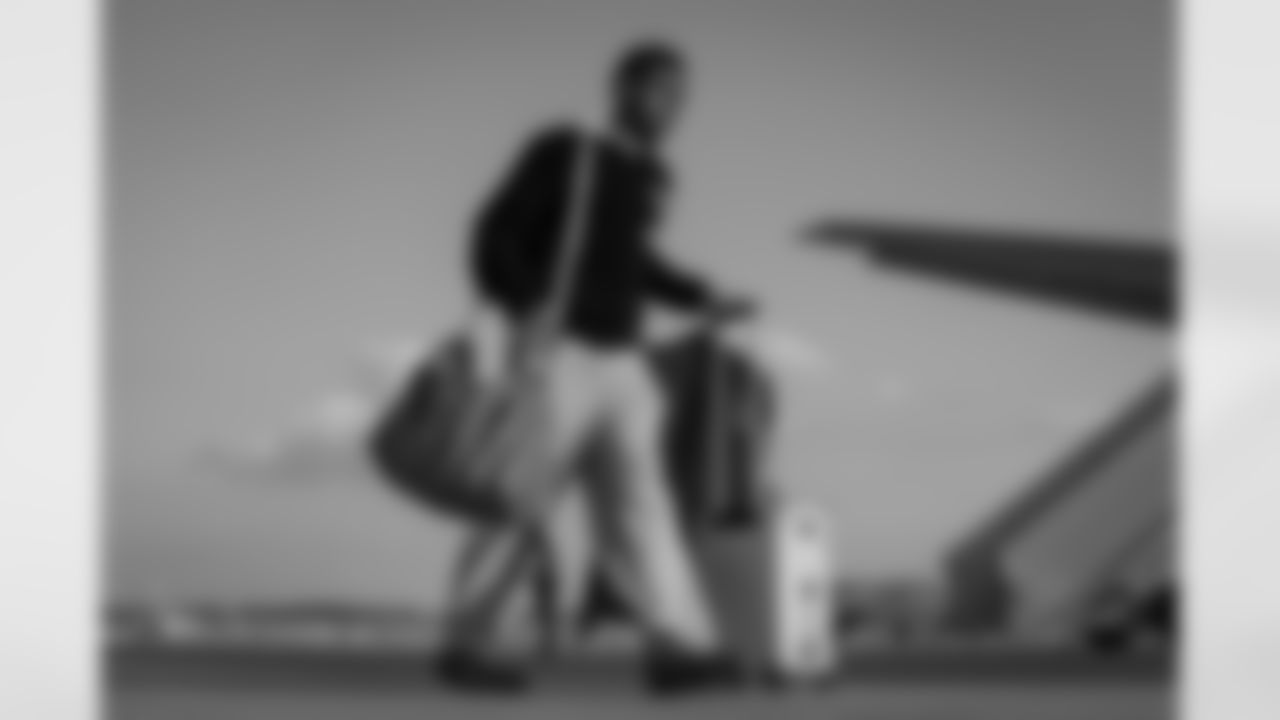 Atlanta Falcons wide receiver Darnell Mooney #1 boards the plane at Hartsfield-Jackson International Airport in Atlanta, Ga. on Saturday, November 22, 2025. (Photo by Jay Bendlin/Atlanta Falcons)