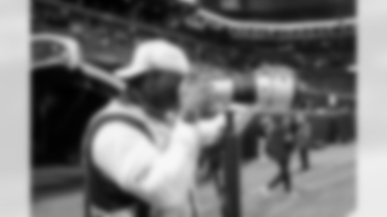 Ken Griffey Jr. photographs warm ups before the Week 14 Game against the Seattle Seahawks at Mercedes-Benz Stadium in Atlanta, Georgia on Sunday, December 7, 2025. (Photo by Brandon Magnus/Atlanta Falcons)