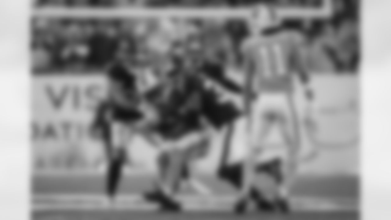 Atlanta Falcons safety Jessie Bates III #3 and Atlanta Falcons safety Xavier Watts #31 combine for a tackle during the Week 15 Game against the Tampa Bay Buccaneers at Raymond James Stadium in Tampa, Florida on Thursday, December 11, 2025. (Photo by Jay Bendlin/Atlanta Falcons)