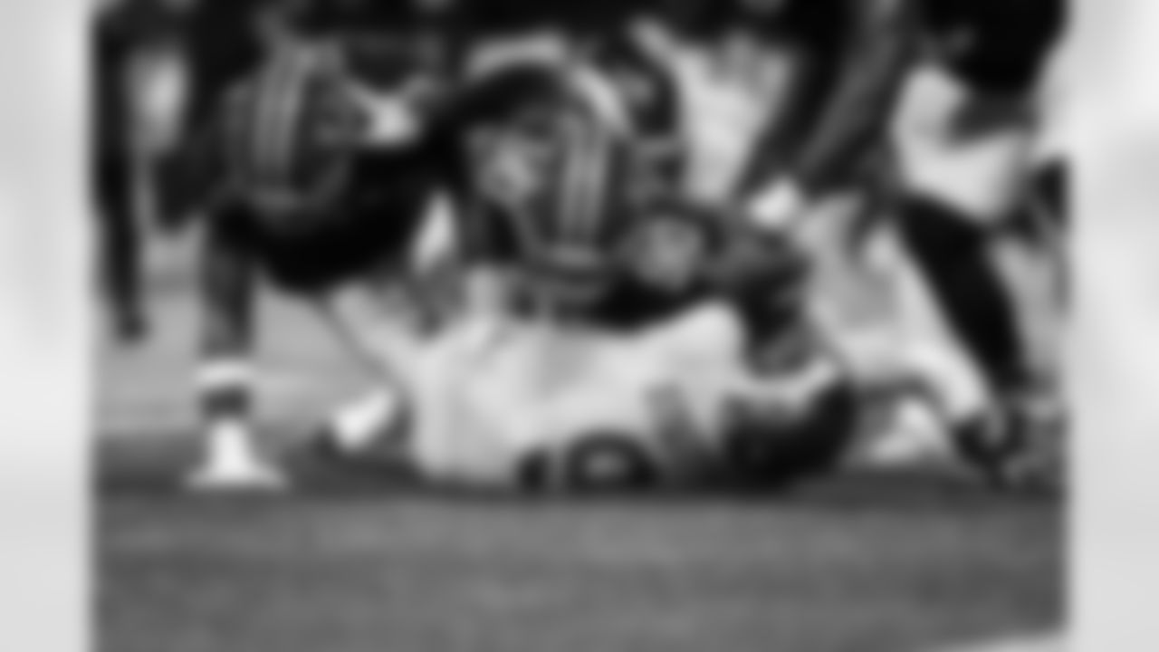 Atlanta Falcons edge rusher Leonard Floyd #56 and Atlanta Falcons defensive lineman David Onyemata #90 make a sack during the Week 17 Game against the Los Angeles Rams at Mercedes-Benz Stadium in Atlanta, Georgia on Monday, December 29, 2025. (Photo by AJ Reynolds/Atlanta Falcons)