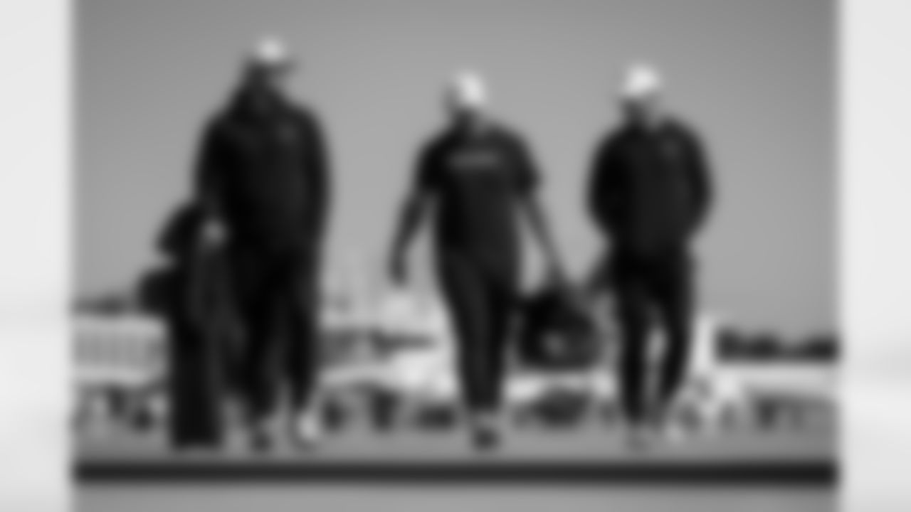 Atlanta Falcons tackle Jake Matthews #70, Atlanta Falcons tight end Charlie Woerner #89, and Atlanta Falcons punter Bradley Pinion #13 boards the plane at Hartsfield-Jackson International Airport in Atlanta, Ga. on Saturday, November 1, 2025. (Photo by Jay Bendlin/Atlanta Falcons)