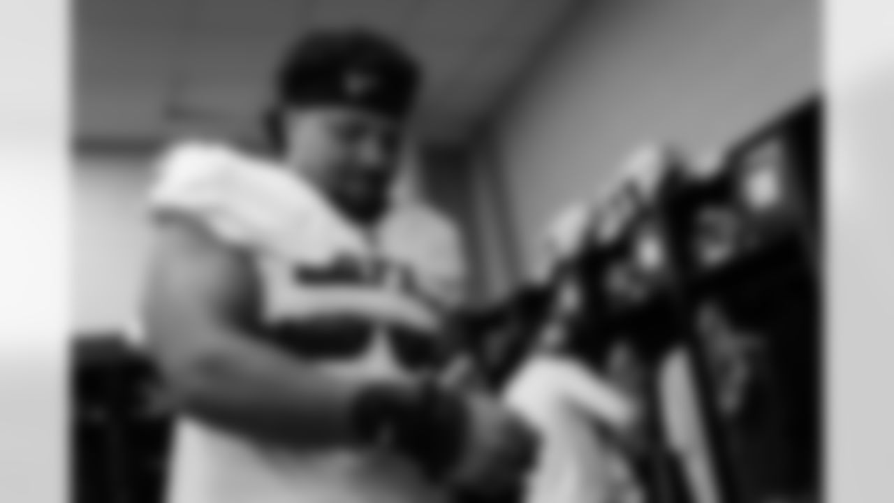 Atlanta Falcons offensive lineman Jovaughn Gwyn #52 prepares in the locker room before the Week 3 Game against the Carolina Panthers at Bank of America Stadium in Charlotte, N.C. on Sunday, September 21, 2025. (Photo by Jay Bendlin/Atlanta Falcons)