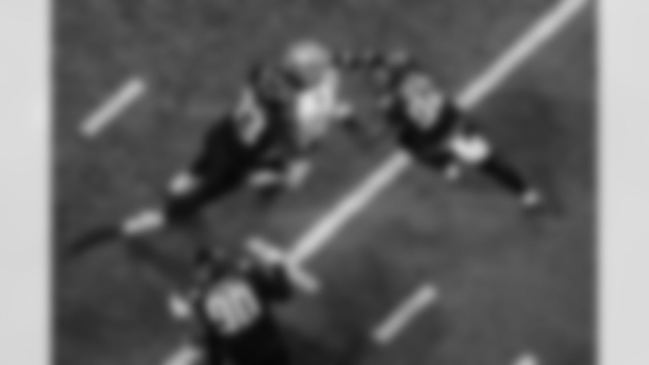 Atlanta Falcons defensive lineman Kentavius Street #93 and Atlanta Falcons linebacker Khalid Kareem #92 make a tackle during the Week 18 Game against the New Orleans Saints at Mercedes-Benz Stadium in Atlanta, Georgia on Sunday, January 4, 2026. (Photo by Taylor McLaughlin/Atlanta Falcons)