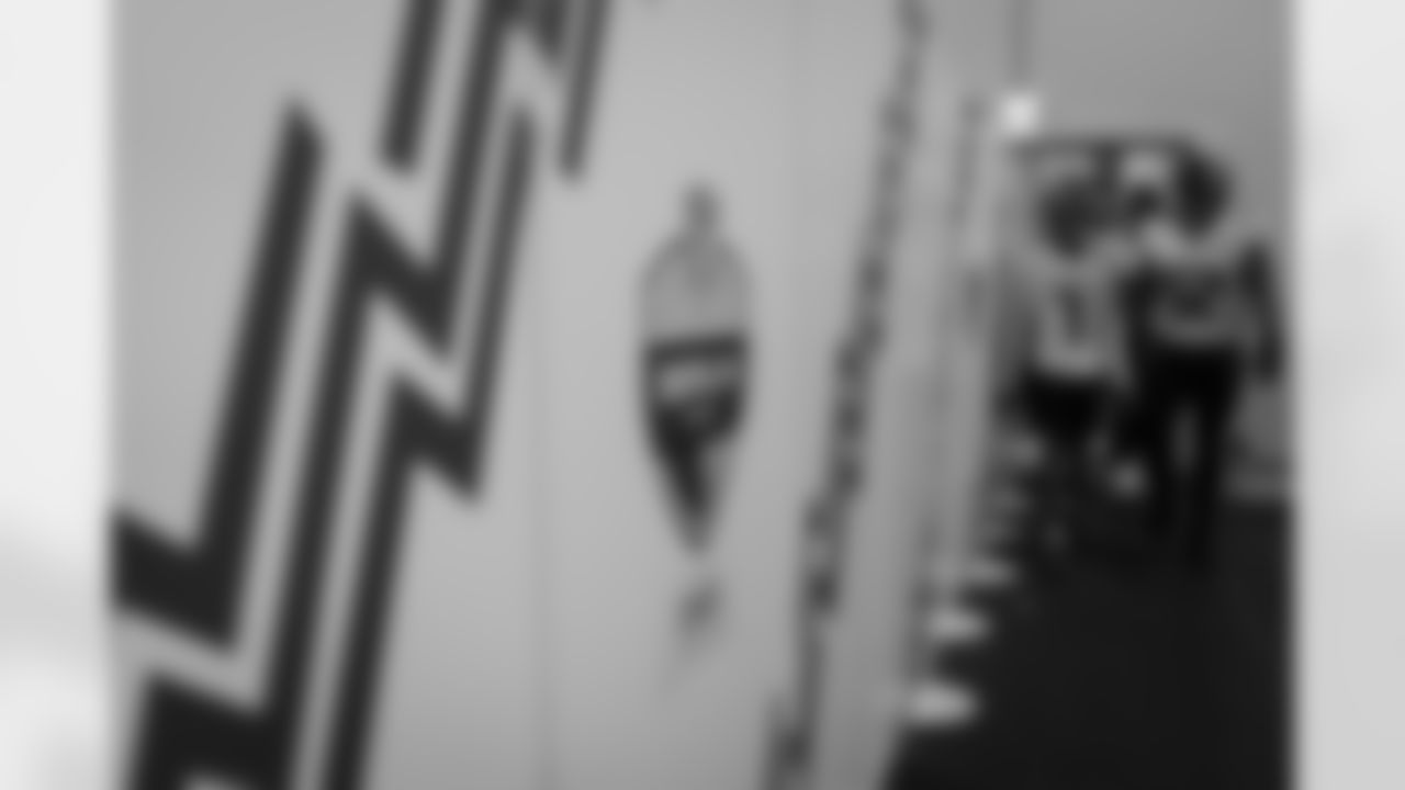 Atlanta Falcons wide receiver Darnell Mooney #1 and Atlanta Falcons offensive lineman Jovaughn Gwyn #52 prepares in the locker room before the Week 10 Game against the Indianapolis Colts at Olympic Stadium in Berlin, Germany on Sunday, November 9, 2025. (Photo by Jay Bendlin/Atlanta Falcons)