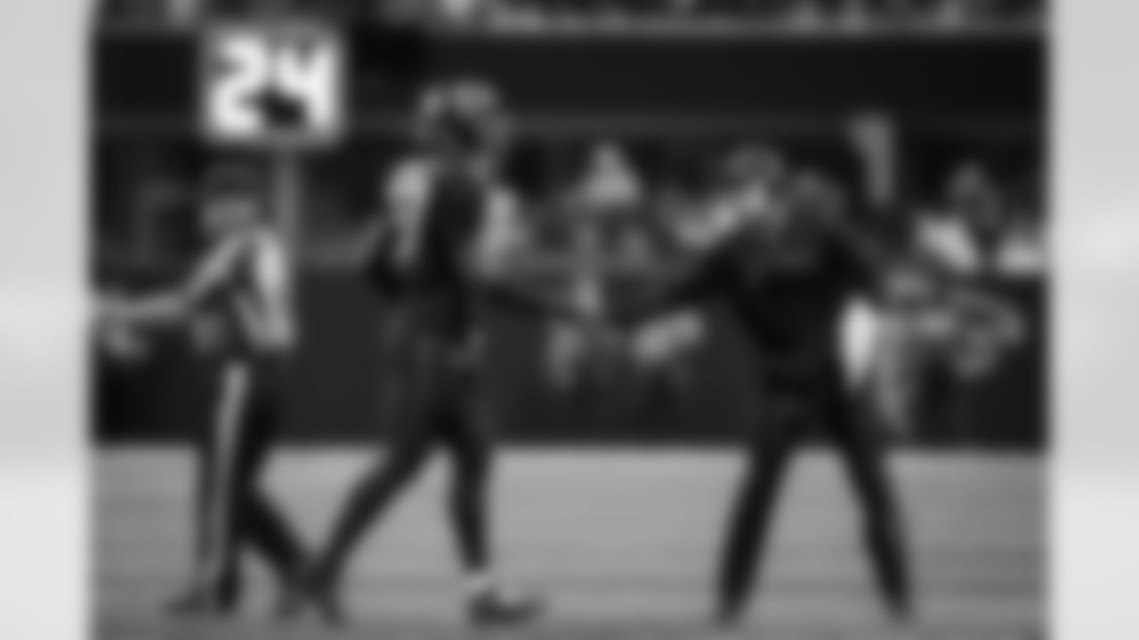 Atlanta Falcons defensive coordinator Jeff Ulbrich and Atlanta Falcons edge rusher James Pearce Jr. #27 during the Week 14 Game against the Seattle Seahawks at Mercedes-Benz Stadium in Atlanta, Georgia on Sunday, December 7, 2025. (Photo by Taylor McLaughlin/Atlanta Falcons)