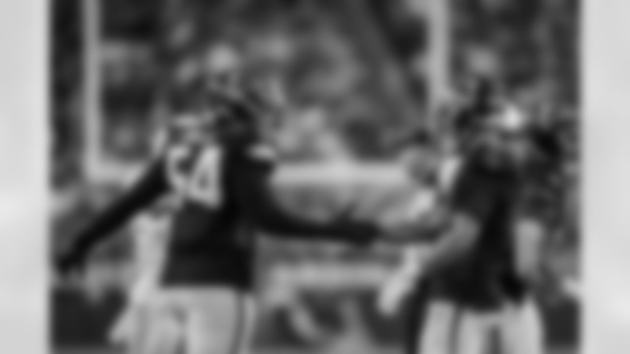 Atlanta Falcons defensive tackle Brandon Dorlus #54 celebrates with Atlanta Falcons safety Jessie Bates III #3 after making a sack during the Week 16 Game against the Arizona Cardinals at State Farm Stadium in Glendale, Arizona on Sunday, December 21, 2025. (Photo by Taylor McLaughlin/Atlanta Falcons)