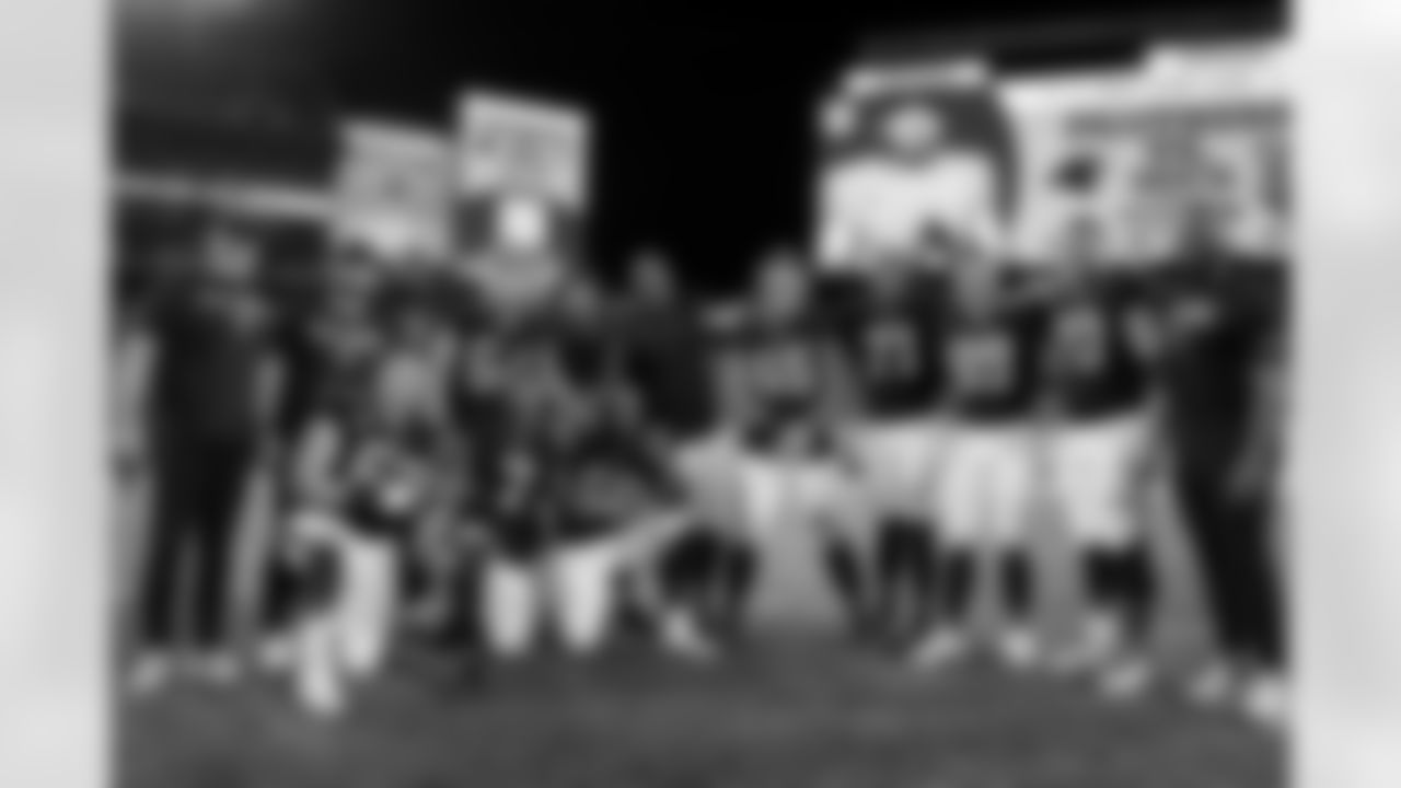 Atlanta Falcons pose for a group photograph (Atlanta Falcons offensive lineman Ryan Neuzil #64, Atlanta Falcons guard Chris Lindstrom #63, Atlanta Falcons running back Bijan Robinson #7 , Atlanta Falcons offensive lineman Kyle Hinton #68 , Atlanta Falcons tight end Kyle Pitts Sr. #8 , Atlanta Falcons offensive lineman Jovaughn Gwyn #52 , Atlanta Falcons offensive lineman Matthew Bergeron #65 , Atlanta Falcons offensive lineman Elijah Wilkinson #71 , Atlanta Falcons tight end Charlie Woerner #89 , Atlanta Falcons tackle Jake Matthews #70 ) during the Week 15 Game against the Tampa Bay Buccaneers at Raymond James Stadium in Tampa, Florida on Thursday, December 11, 2025. (Photo by Jay Bendlin/Atlanta Falcons)