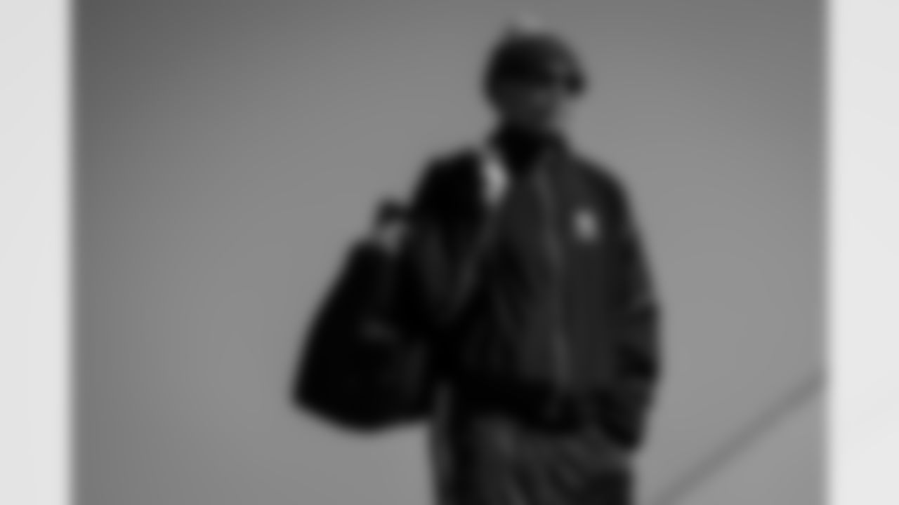 Atlanta Falcons cornerback Mike Hughes #21 boards the plane at Hartsfield-Jackson International Airport in Atlanta, Ga. on Saturday, November 1, 2025. (Photo by Jay Bendlin/Atlanta Falcons)