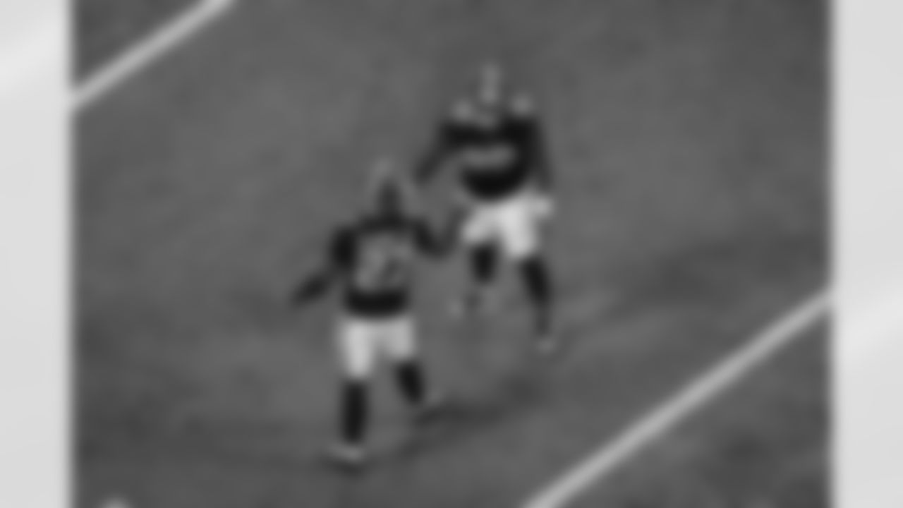 Atlanta Falcons defensive lineman Ruke Orhorhoro #98 and Atlanta Falcons edge rusher James Pearce Jr. #27 react during the Week 17 Game against the Los Angeles Rams at Mercedes-Benz Stadium in Atlanta, Georgia on Monday, December 29, 2025. (Photo by Jay Bendlin/Atlanta Falcons)