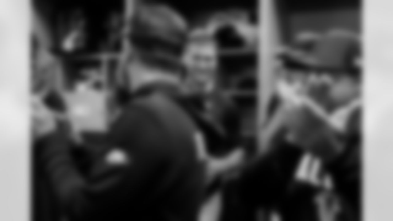 Atlanta Falcons quarterback Kirk Cousins #18 celebrates in the locker room during the Week 15 Game against the Tampa Bay Buccaneers at Raymond James Stadium in Tampa, Florida on Thursday, December 11, 2025. (Photo by Jay Bendlin/Atlanta Falcons)