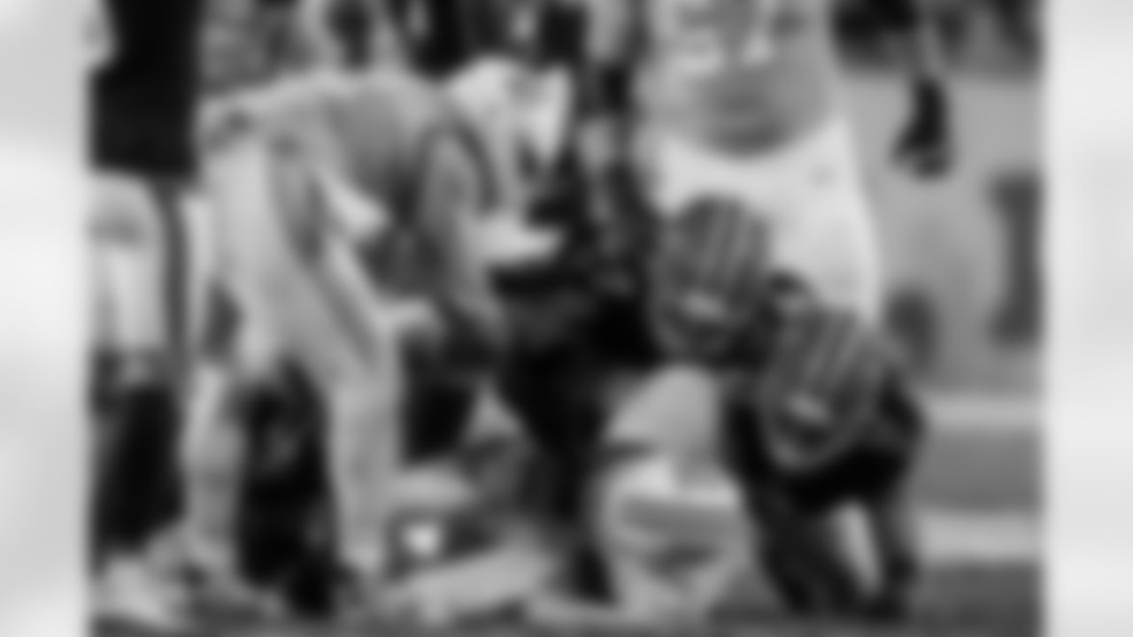 Atlanta Falcons edge rusher Jalon Walker #11 , Atlanta Falcons defensive tackle Brandon Dorlus #54 and Atlanta Falcons outside linebacker Divine Deablo #0 combine for a sack during the Week 15 Game against the Tampa Bay Buccaneers at Raymond James Stadium in Tampa, Florida on Thursday, December 11, 2025. (Photo by Taylor McLaughlin/Atlanta Falcons)